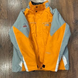 orange north face jacket